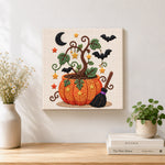 Finished magic pumpkin pot artwork displayed on a wall