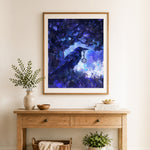 Finished magic raven with key cross stitch artwork displayed as home decor