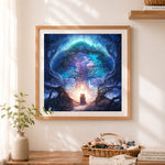 Finished magical ancient tree with glowing light cross stitch artwork displayed as home decor