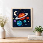 Finished magical and colorful solar system artwork displayed on a wall