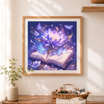 Finished magical purple flower blooming from open book cross stitch artwork displayed as home decor