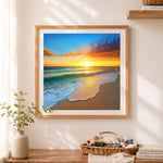 Finished majestic orange sunset over rolling ocean waves cross stitch artwork displayed as home decor