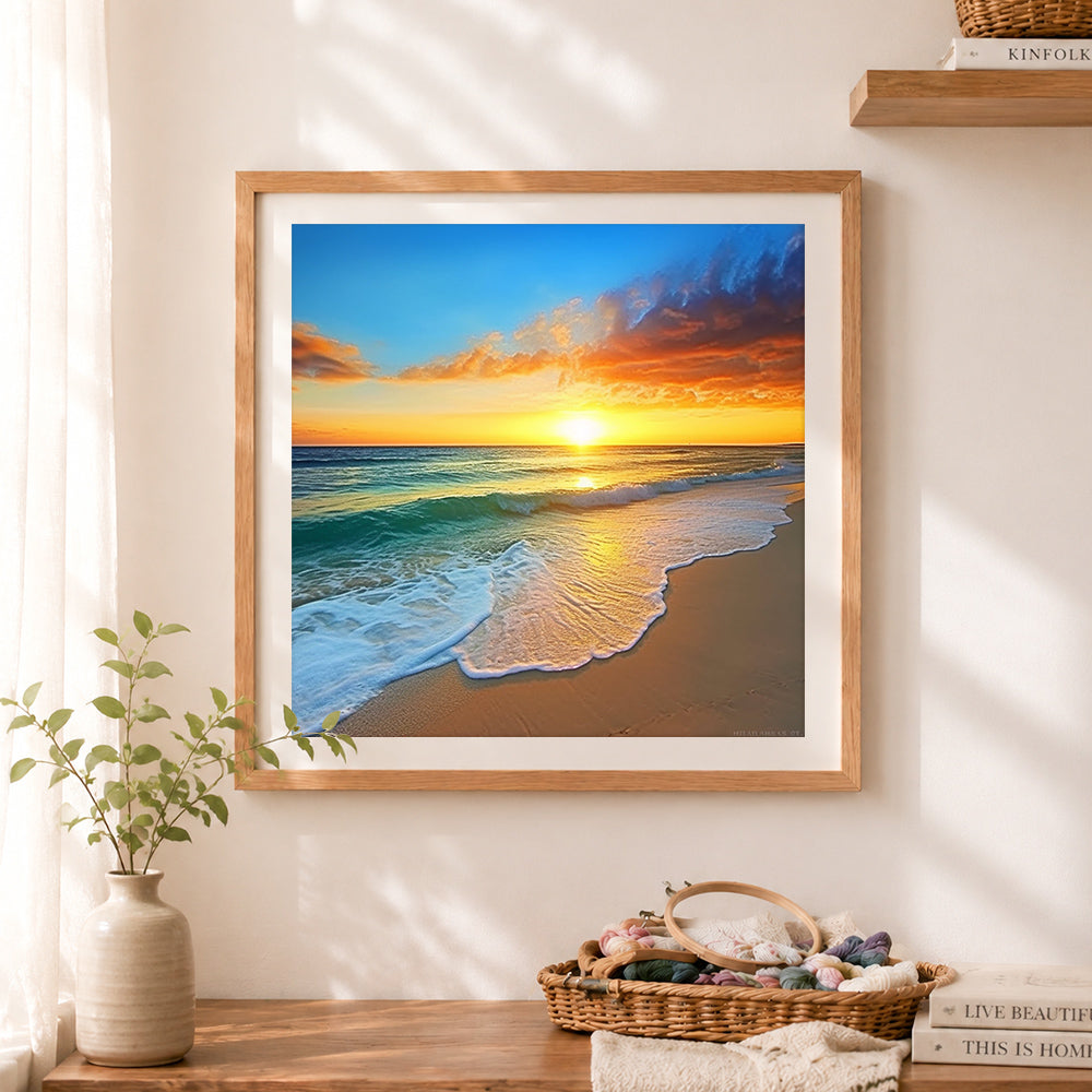 Finished majestic orange sunset over rolling ocean waves cross stitch artwork displayed as home decor