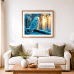 Finished majestic snowy owl in golden winter forest cross stitch artwork displayed as home decor