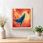 Finished majestic whale sunset artwork displayed on a wall