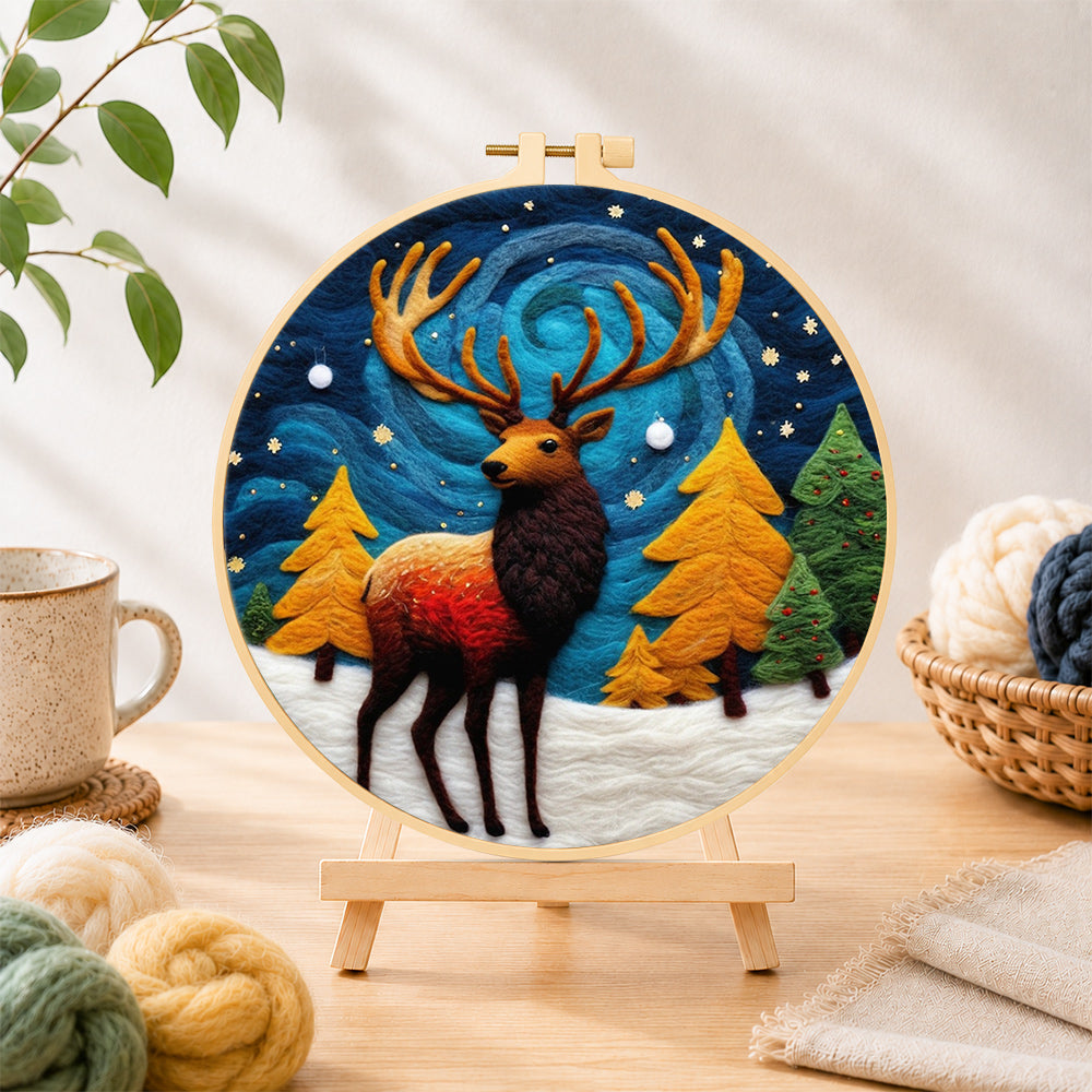 Finished majestic winter stag needle felting displayed on a wooden easel
