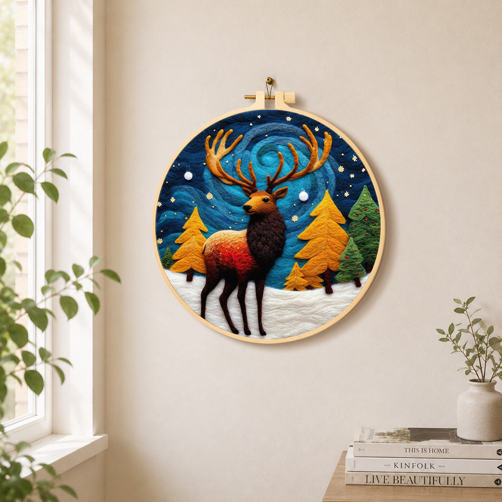 Majestic winter stag needle felt wall art displayed in a bright home interior
