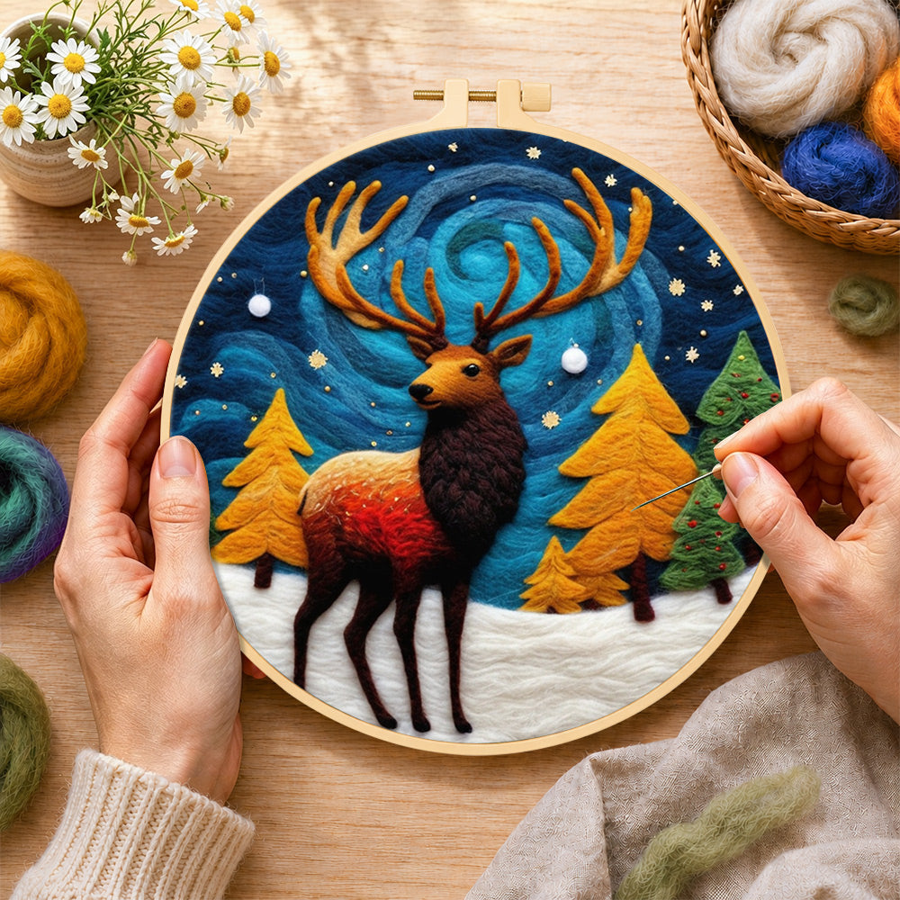 Creating the majestic winter stag wool painting by hand with a felting needle