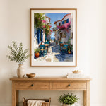 Finished mediterranean white alley with bougainvillea cross stitch artwork displayed as home decor