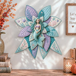 Mermaid quilted bow displayed as handmade wall decor in a cozy home