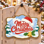 Merry christmas santa hat and bell paint by numbers door hanger on a garden gate
