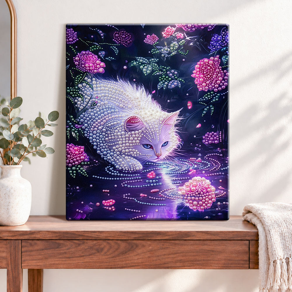Finished midnight floral kitty pearl diamond painting artwork displayed as home decor