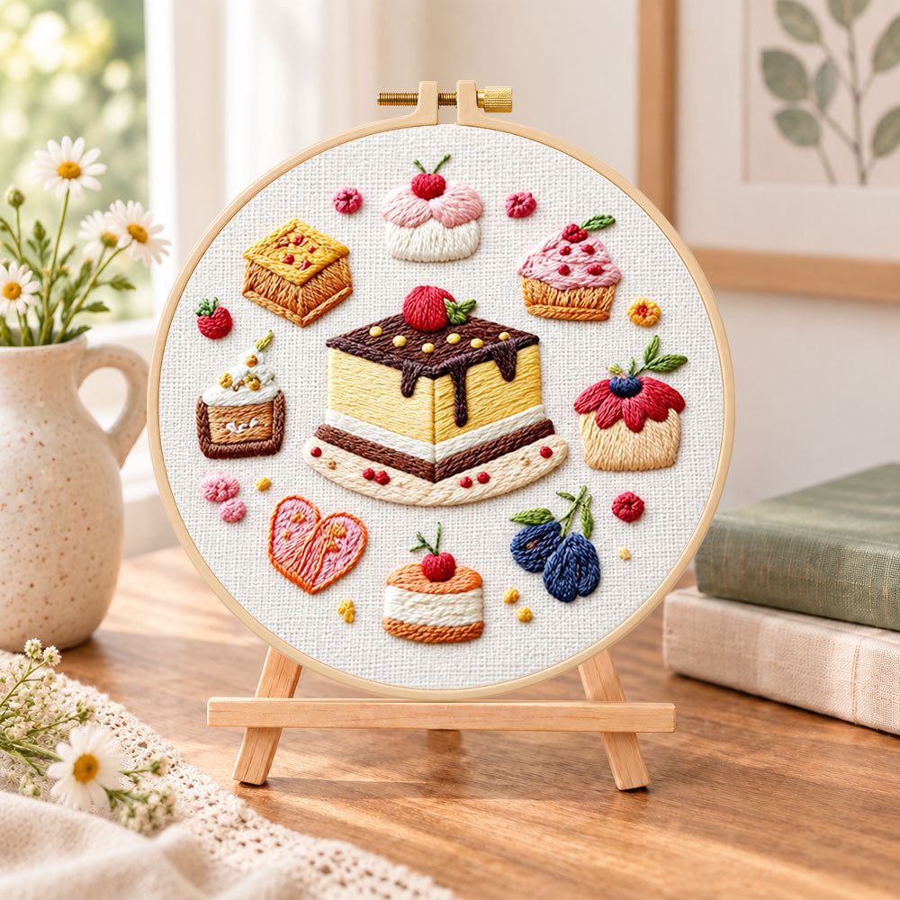 Mini dessert collection embroidery kit finished hoop displayed on a wooden stand as cozy tabletop decor