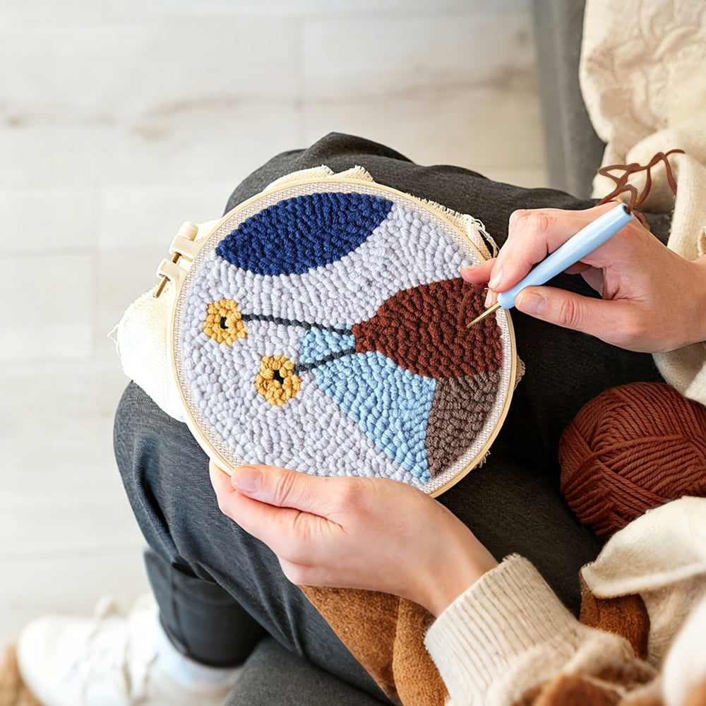 Creating handmade minimalist flower arrangement punch needle artwork
