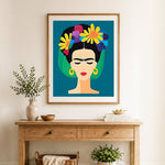 Finished minimalist frida kahlo portrait with floral crown cross stitch artwork displayed as home decor
