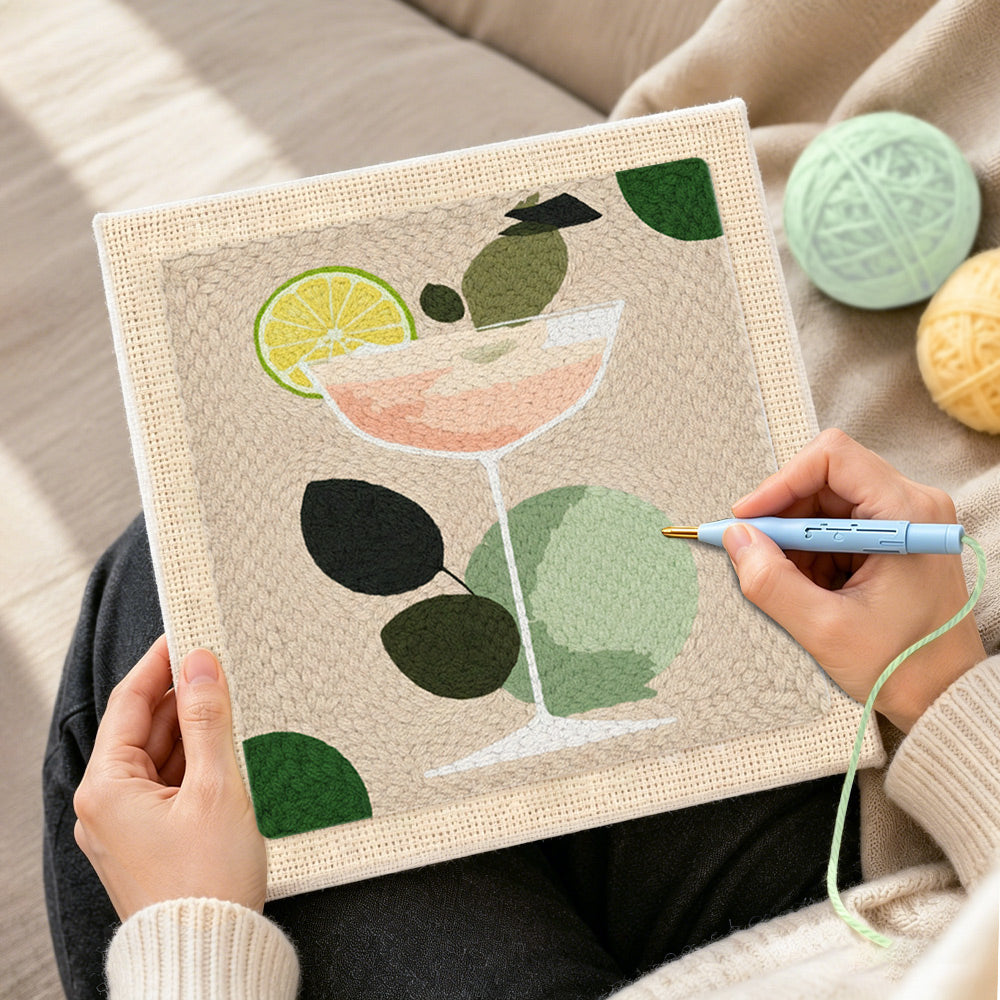 Creating handmade minimalist peach cocktail with lime punch needle artwork
