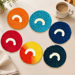 Minimalist rainbow arc punch needle coasters used for home decoration