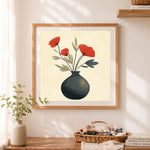 Finished minimalist red poppies in dark vase cross stitch artwork displayed as home decor