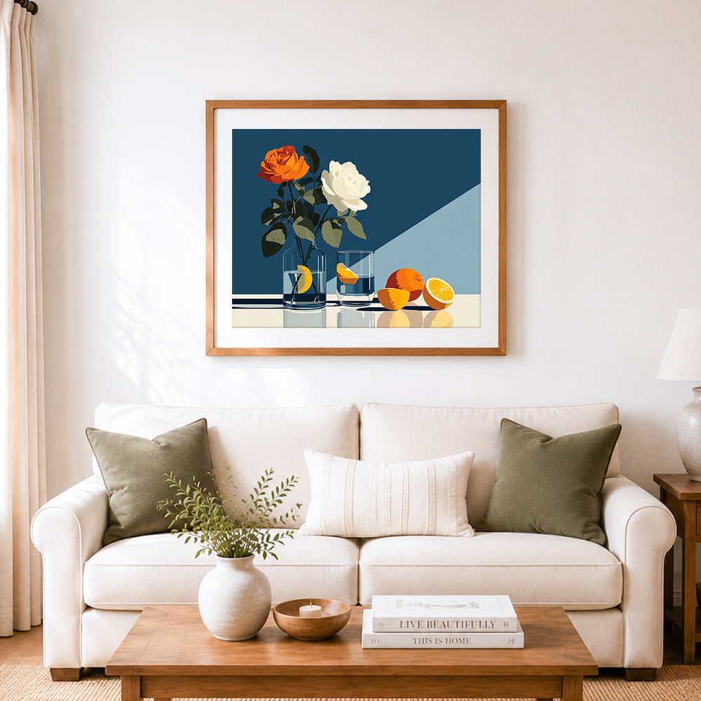 Finished minimalist rose and citrus cross stitch artwork displayed as home decor