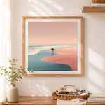 Finished minimalist solitary surfer at sunset cross stitch artwork displayed as home decor