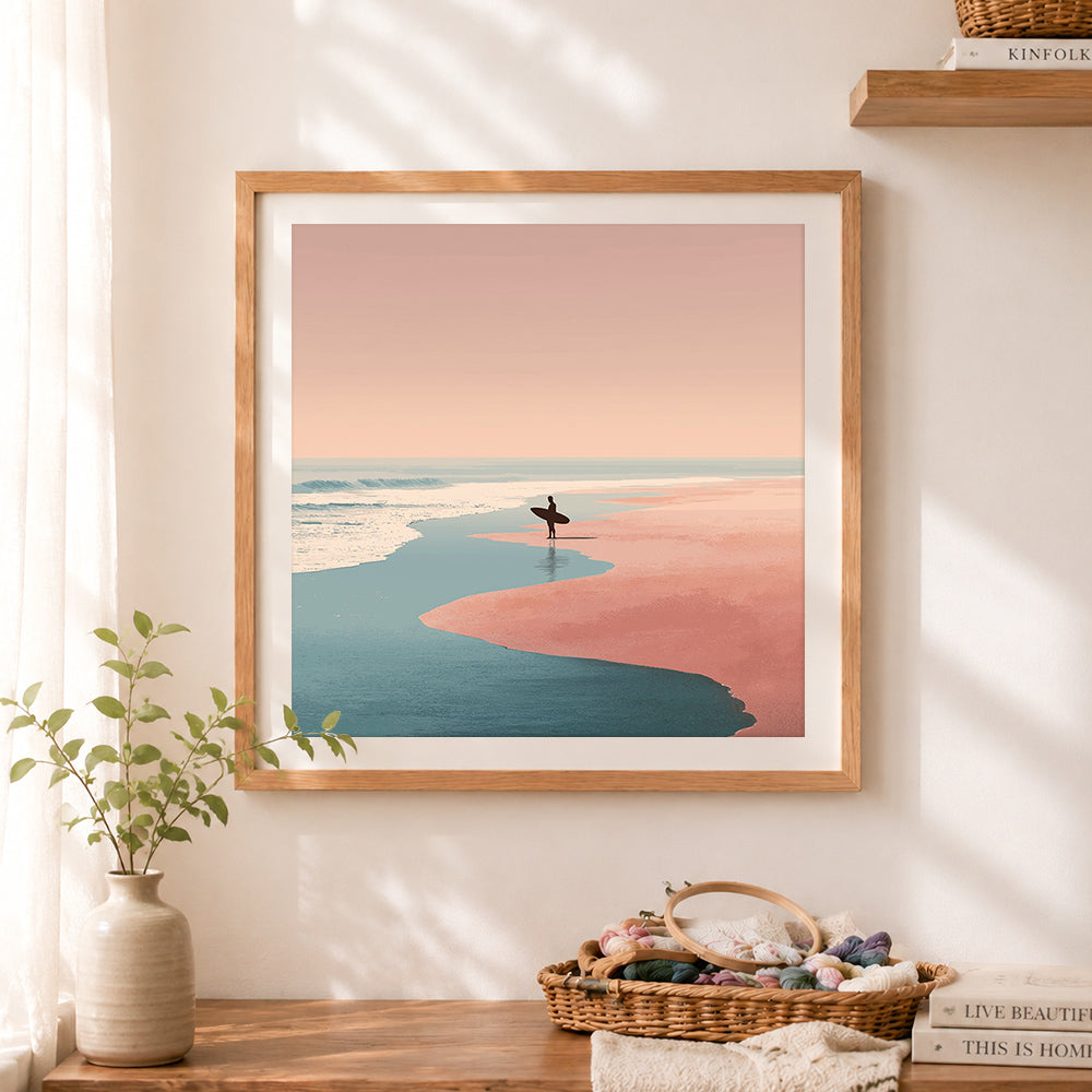 Finished minimalist solitary surfer at sunset cross stitch artwork displayed as home decor