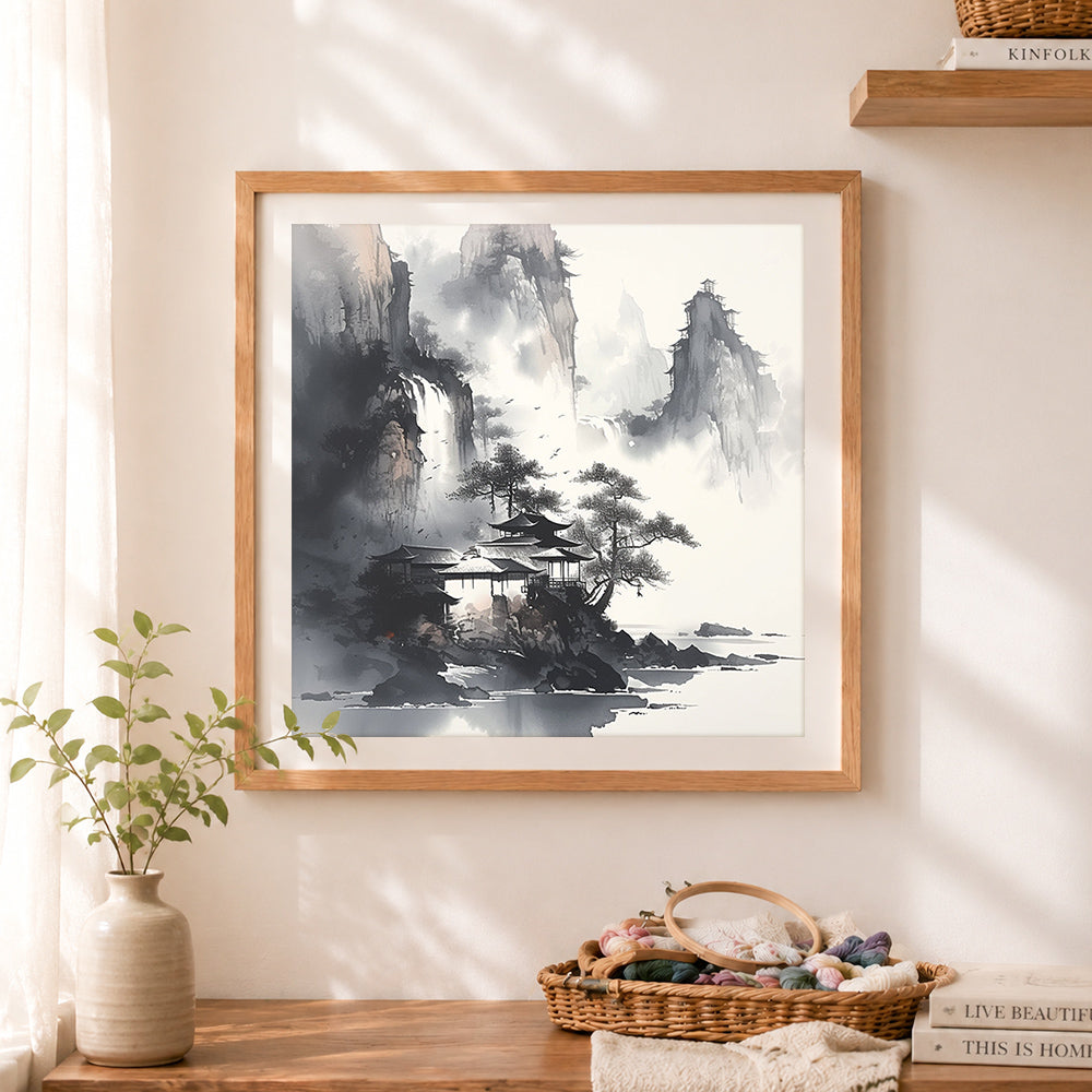 Finished misty mountain ink painting cross stitch artwork displayed as home decor