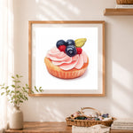 Finished mixed berry cupcake cross stitch artwork displayed as home decor