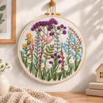 Mixed wildflower field embroidery hoop wall art displayed as warm and cozy handmade home decor
