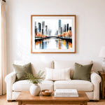 Finished modern waterfront skyline cross stitch artwork displayed as home decor