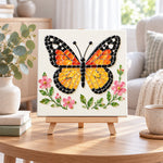 Monarch butterfly sea glass art kit displayed as seasonal home decor