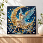 Finished moon fairy with wings pearl diamond painting artwork displayed as holiday home decor