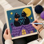 Creating handmade moonlight cat love punch needle artwork