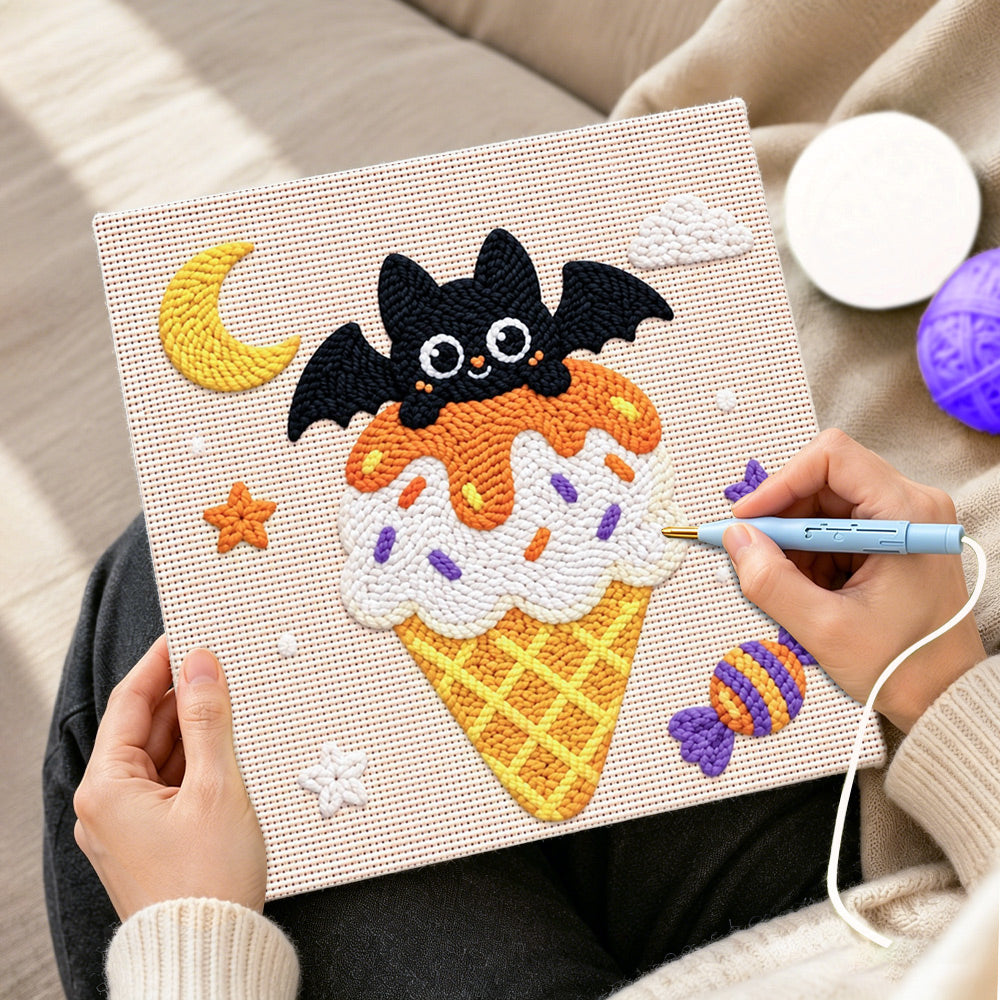 Creating handmade moonlit bat ice cream punch needle artwork