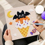 Creating handmade moonlit bat ice cream punch needle artwork