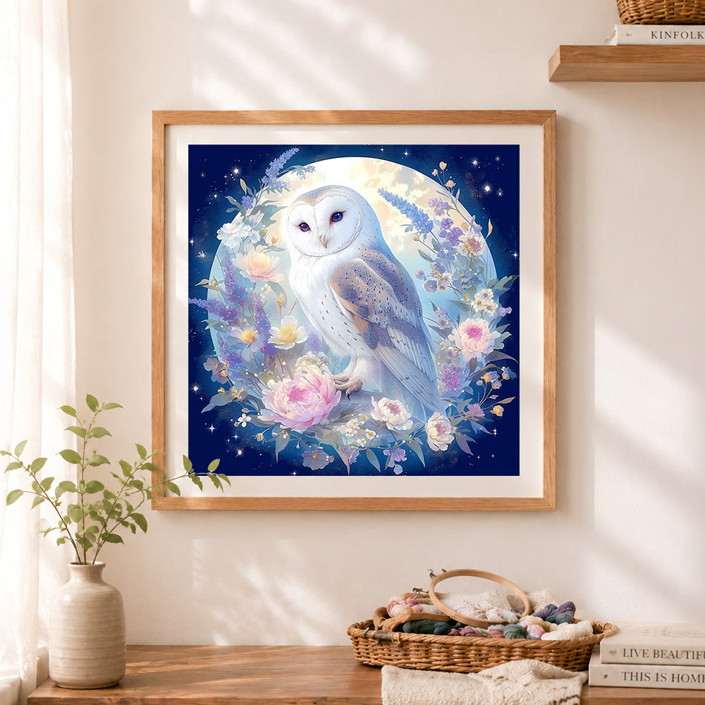 Finished moonlit floral owl cross stitch artwork displayed as home decor