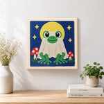 Finished moonlit frog ghost artwork displayed on a wall