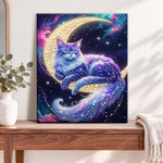 Finished moonlit galaxy feline pearl diamond painting artwork displayed as home decor