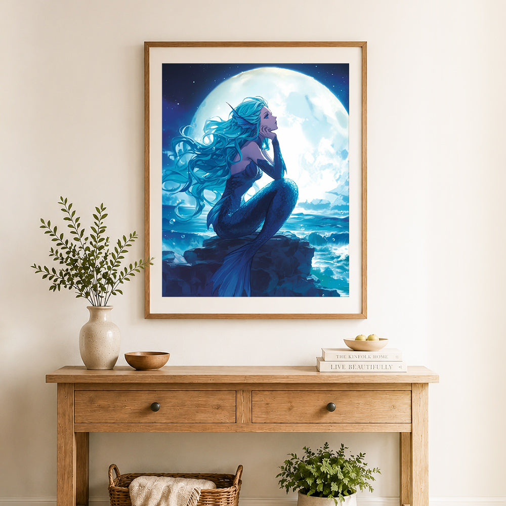 Finished moonlit mermaid on seaside rocks cross stitch artwork displayed as home decor