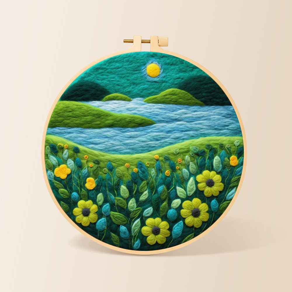 Moonlit river scene with bright flowers needle felting kit for beginners with a round wooden frame