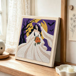 Moonlit witch bride punch needle artwork displayed on a table