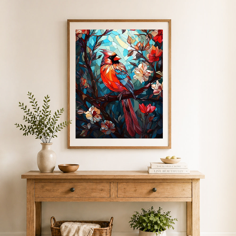 Finished mosaic style northern cardinal cross stitch artwork displayed as home decor