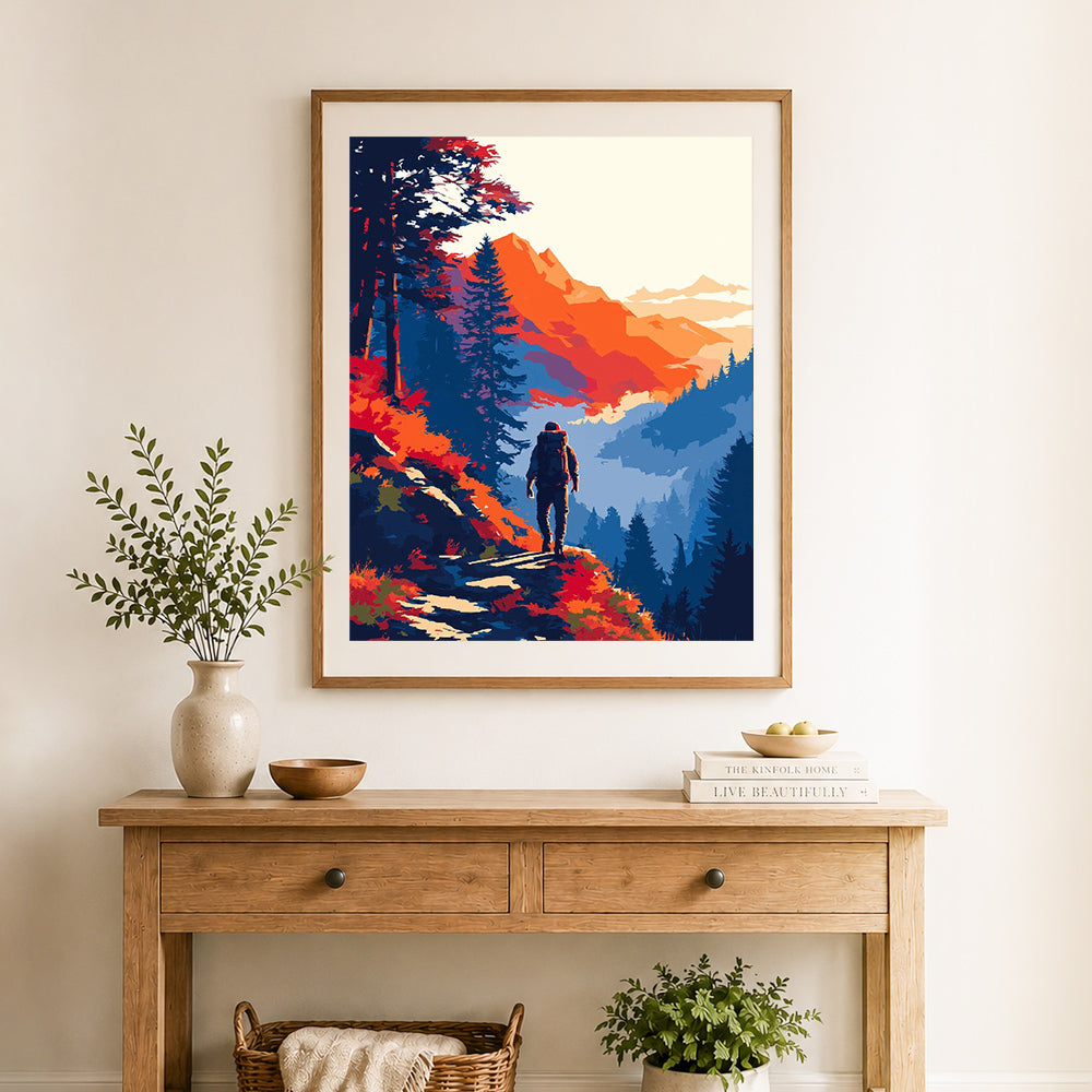 Finished mountain hiking adventure cross stitch artwork displayed as home decor