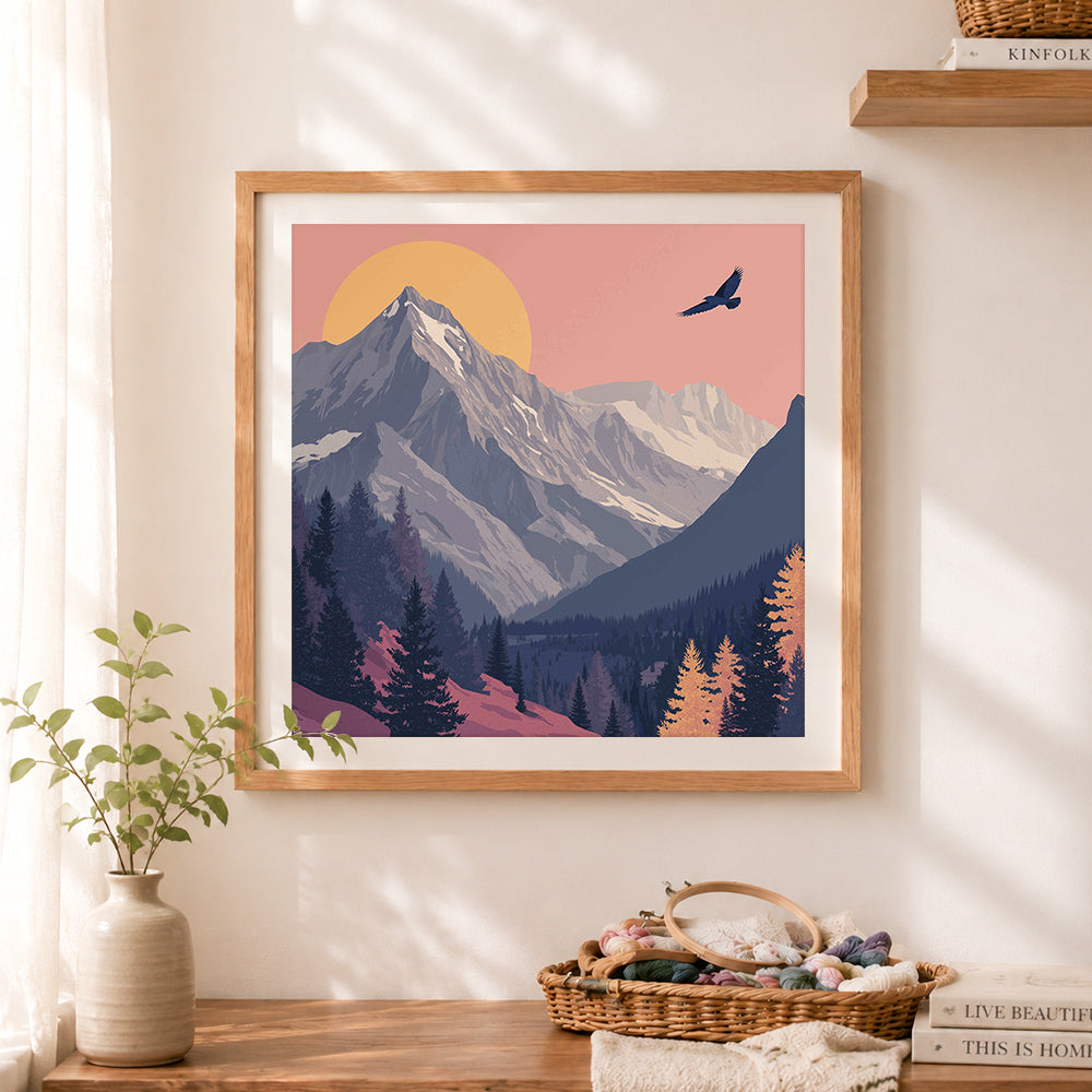 Finished mountain peak with flying raven cross stitch artwork displayed as home decor
