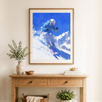 Finished mountain skiing adventure cross stitch artwork displayed as home decor