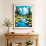 Finished mountain stream valley cross stitch artwork displayed as home decor