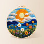 Mountains and wildflowers at sunset needle felting kit for beginners with a round wooden frame