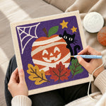 Creating handmade mummy apple and black cat punch needle artwork