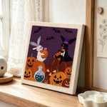 Mummy bunny halloween punch needle artwork displayed on a table