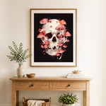 Finished mushroom covered skull cross stitch artwork displayed as home decor