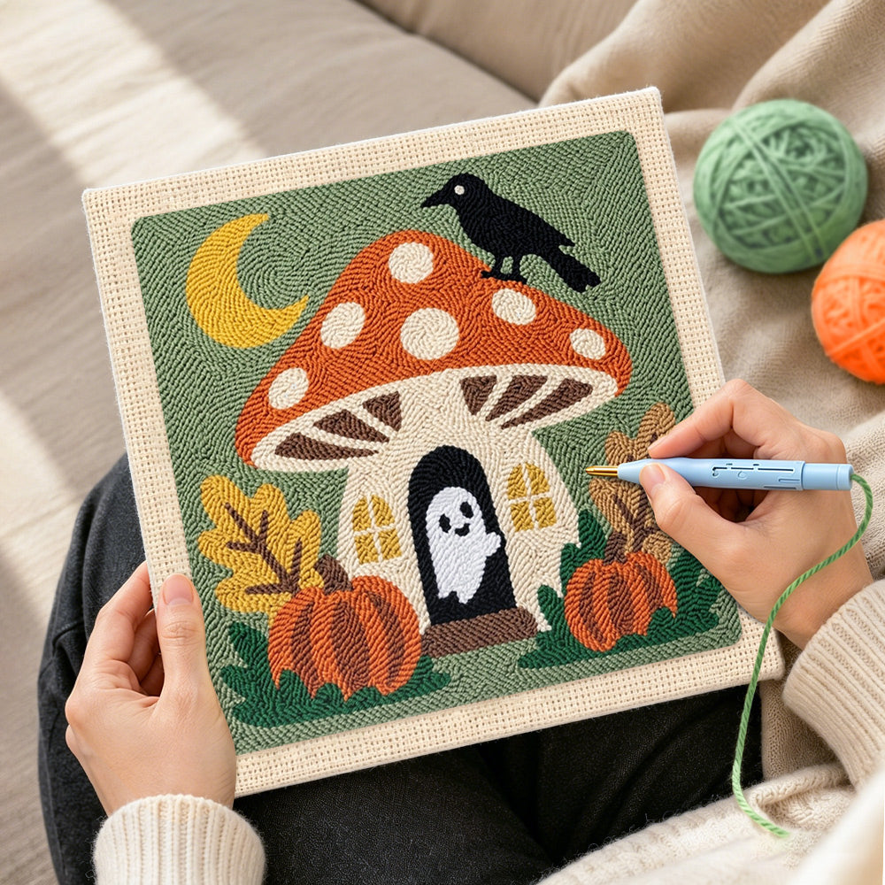 Creating handmade mushroom fairy house with little ghost punch needle artwork